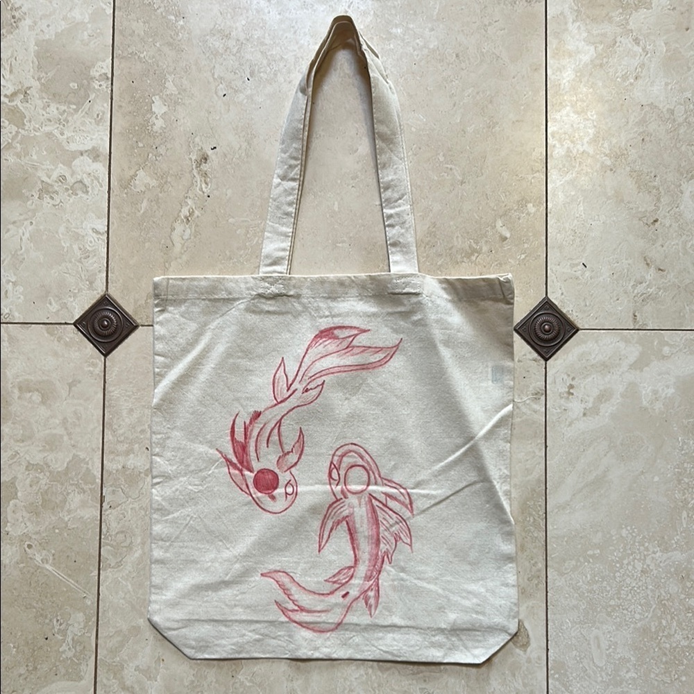 Artistic Cream Tote Bag with Red Fish Design